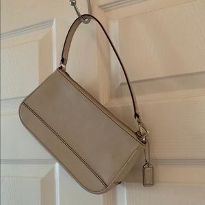 White/cream coach purse